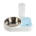 Pet feeding and water station with a stainless steel bowl, blue mat, and clear bottle on a white background.